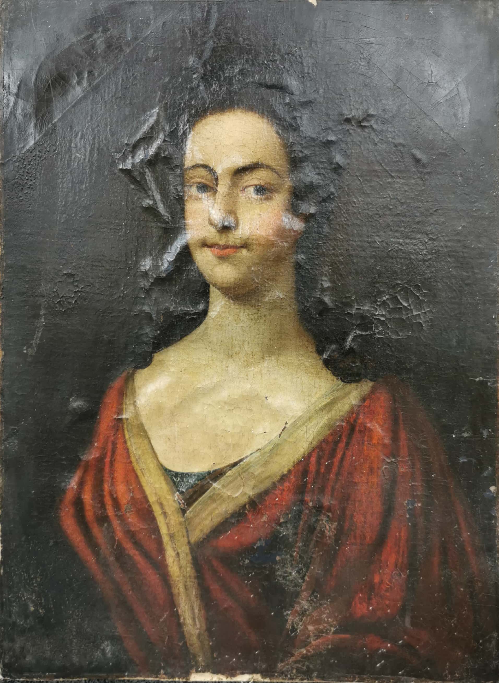 A large 18th century oil on canvas portrait of a lady cut and re-laid on a later canvas and