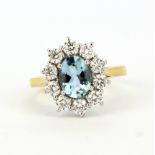 A hallmarked 18ct yellow gold ring set with a large oval cut aquamarine, approx. 1.01ct,