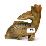 A large early 20th century carved soapstone figure of a carp, 13, L. 17cm.