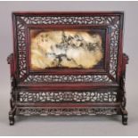 A Chinese framed scholar's desk dream stone, H. 38cm, W. 41cm.