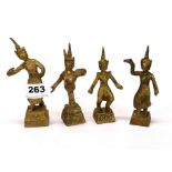 A group of four Siamese early 20th century bronze / brass figures of dancers, H. 13cm.