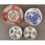 A group of Chinese porcelain plates, largest Dia. 22cm. One A/F.