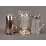 An Edwardian silver plate and cut glass jug, H. 19cm, together with a silver plate hot water jug and