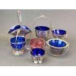 A group of silver plate and glass table baskets, tallest H. 25cm.