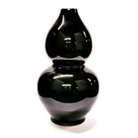 An unusual large Chinese black glazed porcelain table lamp base, H. 40cm.
