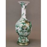 A Japanese hand painted porcelain vase, H. 38cm, minor rim crack.