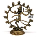 An Indian bronze figure of a Hindu deity dancing amongst flames, H. 18cm.