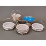 A group of silver plate and glass table preserve baskets.