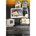 Two Sinclair Spectrum Plus games consoles.