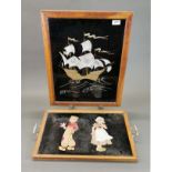 A 1920's oak and foil decorated fire screen, H. 62cm, together with a foil decorated tray.