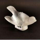 A Lalique crystal bird figure, signed Lalique France, L. 12cm, H. 8cm.