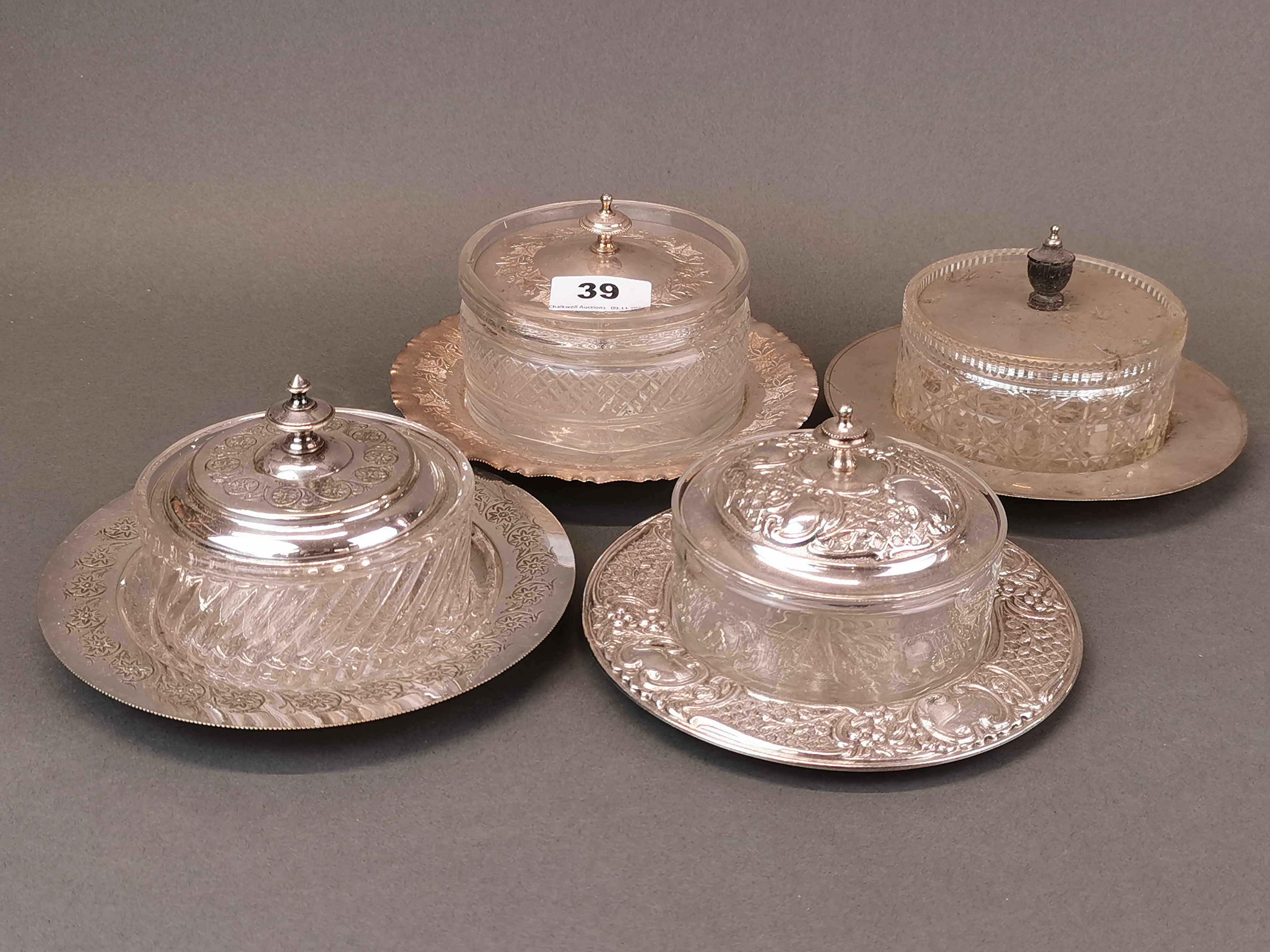 A group of four antique silver plate and glass preserve dishes, Dia. 17cm.