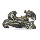 A very unusual Chinese archaic form stone dragon inset with turquoise mosaic, L. 20cm, H. 11cm.