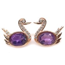 A pair of rose gold on 925 silver swan shaped earrings set with oval cut amethyst, L. 1.3cm.