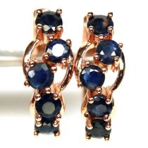 A rose gold on 925 silver earrings set with round cut sapphires, L. 1.5cm.