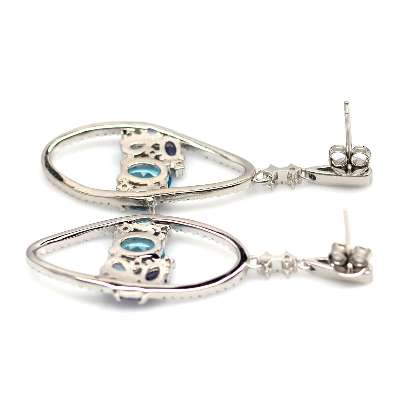 A pair of 925 silver earrings set with blue topaz, tanzanites and white stones, L. 4.5cm. - Image 2 of 2