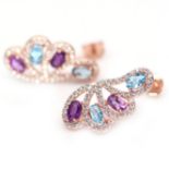 A pair of rose gold on 925 silver earrings set with oval cut blue topaz and amethysts, L. 2.3cm.