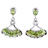 A pair of 925 silver drop earrings set with oval cut peridots and white stones, L. 2.8cm.