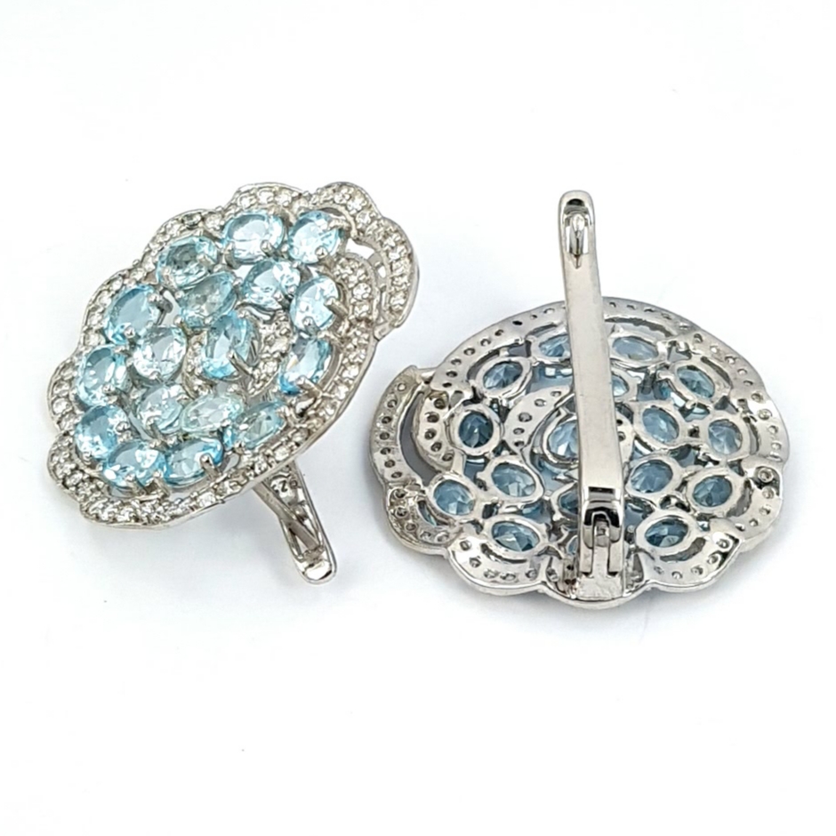A pair of 925 silver cluster earrings set with oval cut blue topaz, Dia. 2.5cm. - Image 2 of 2