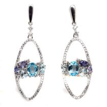 A pair of 925 silver earrings set with blue topaz, tanzanites and white stones, L. 4.5cm.