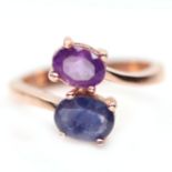 A rose on 925 silver crossover ring set with an oval cut sapphire and amethyst, (M.5).