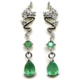 A pair of 925 silver drop earrings set with pear cut emeralds and white stones, L. 2.6cm.