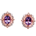 A pair of rose gold on 925 silver earrings set with oval cut amethyst and white stones, L. 1.6cm.