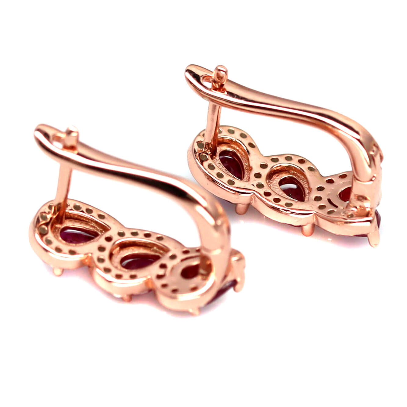 A pair of rose gold on 925 silver earrings set with three oval cut rubies and white stones, L. 1. - Image 2 of 2