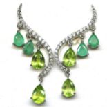 A pair of 925 silver earrings set with pear cut emeralds and peridots, L. 3.8cm.