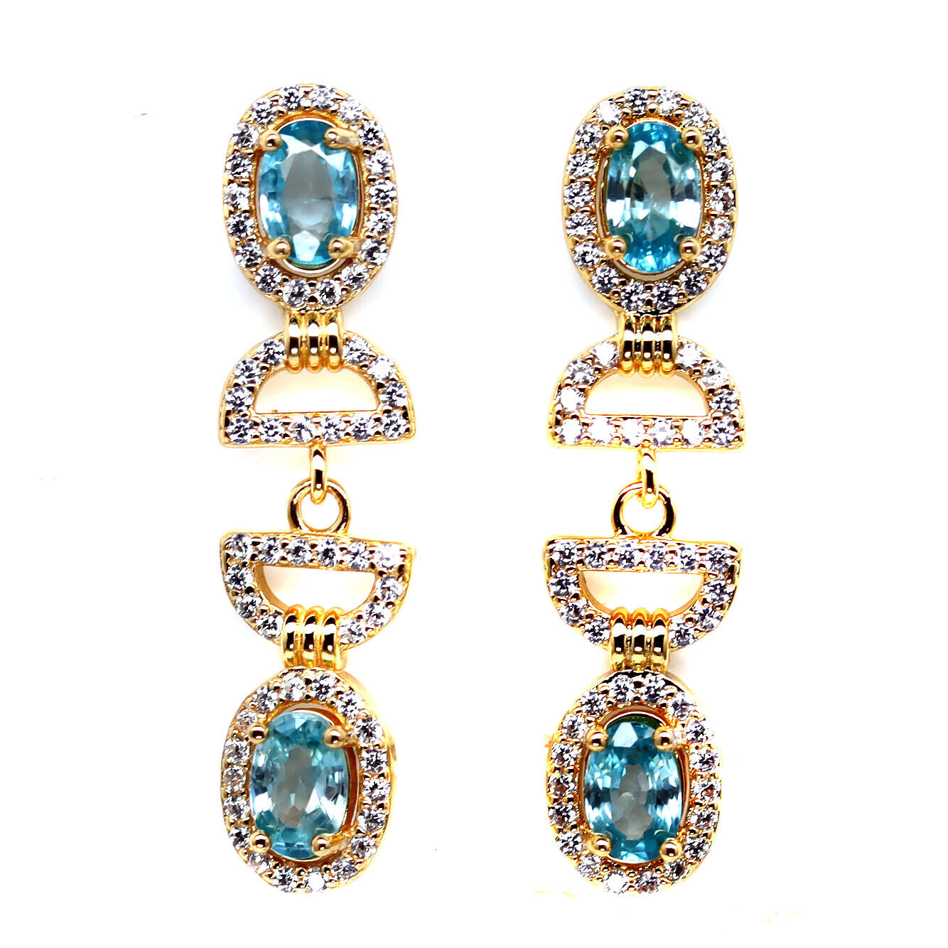 A pair of gold on 925 silver drop earrings set with oval cut seafoam blue topaz and white stones, L.