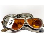 Two pairs of WWII pilots goggles.