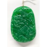 A Chinese carved jade/hardstone pendant amulet, H. 6.5cm.