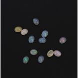 A quantity of unmounted natural opals, approx. 10.32ct total.