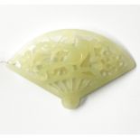 A finely carved Chinese jade fan, W. 7cm.