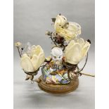 An interesting French 1920's gilt brass and porcelain mounted Chinese porcelain figure of a seated