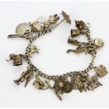 A heavy silver charm bracelet, L. 20cm.