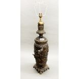 A superb 19th century Japanese bronze oil lamp stand converted for electricity, H. 61cm.