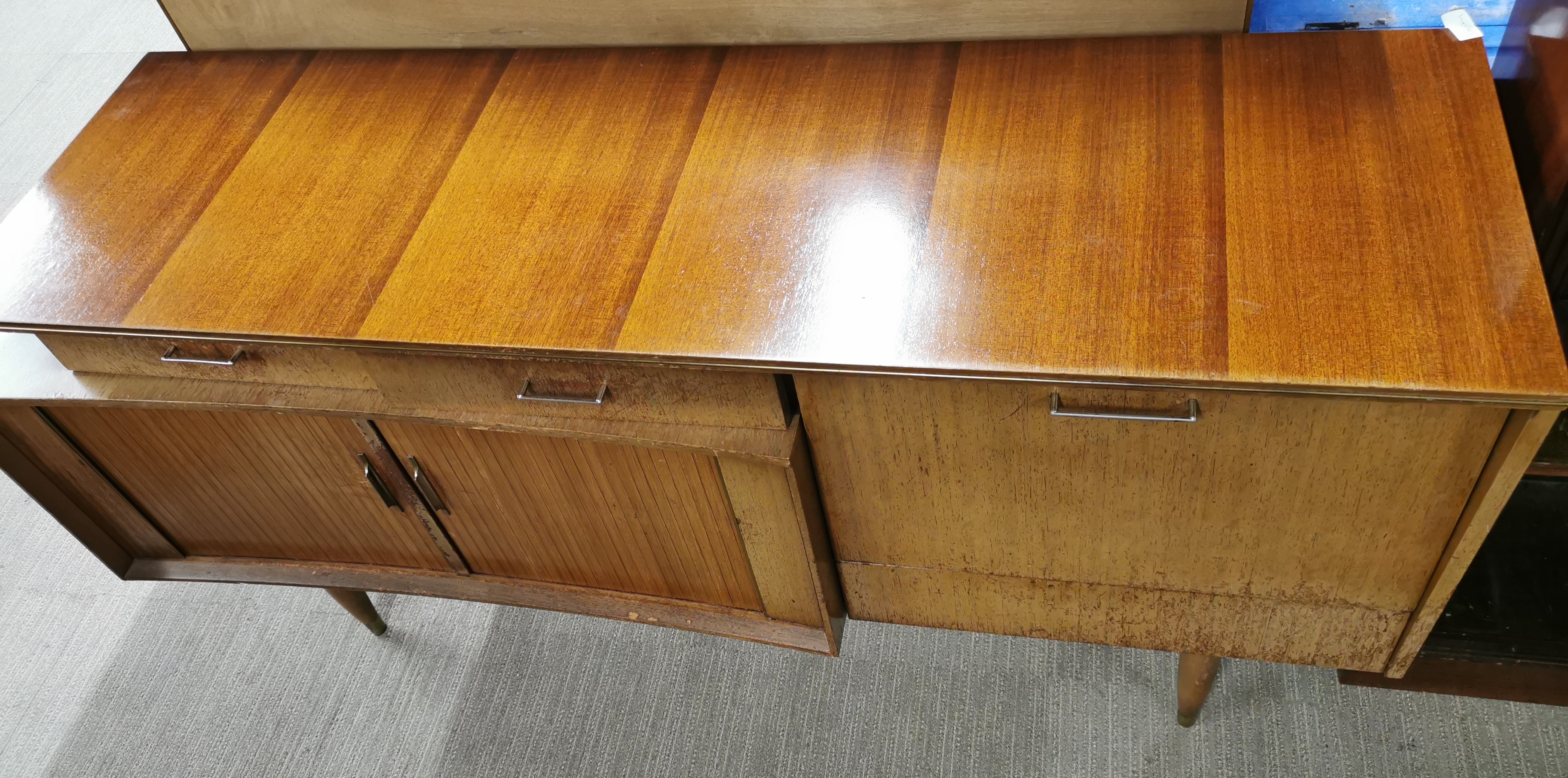 A 1970's teak sideboard with sliding door and a drop down cabinet with glass shelf, 145 x 79 x - Image 2 of 4