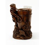 A finely carved Chinese walnut wood figural brush pot, H. 13cm.