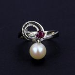 A 14ct white gold Art Nouveau style ring set with a cultured pearl and a round cut ruby, (P.5).