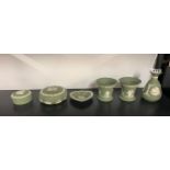 Six pieces of green Wedgwood, tallest H. 13cm.
