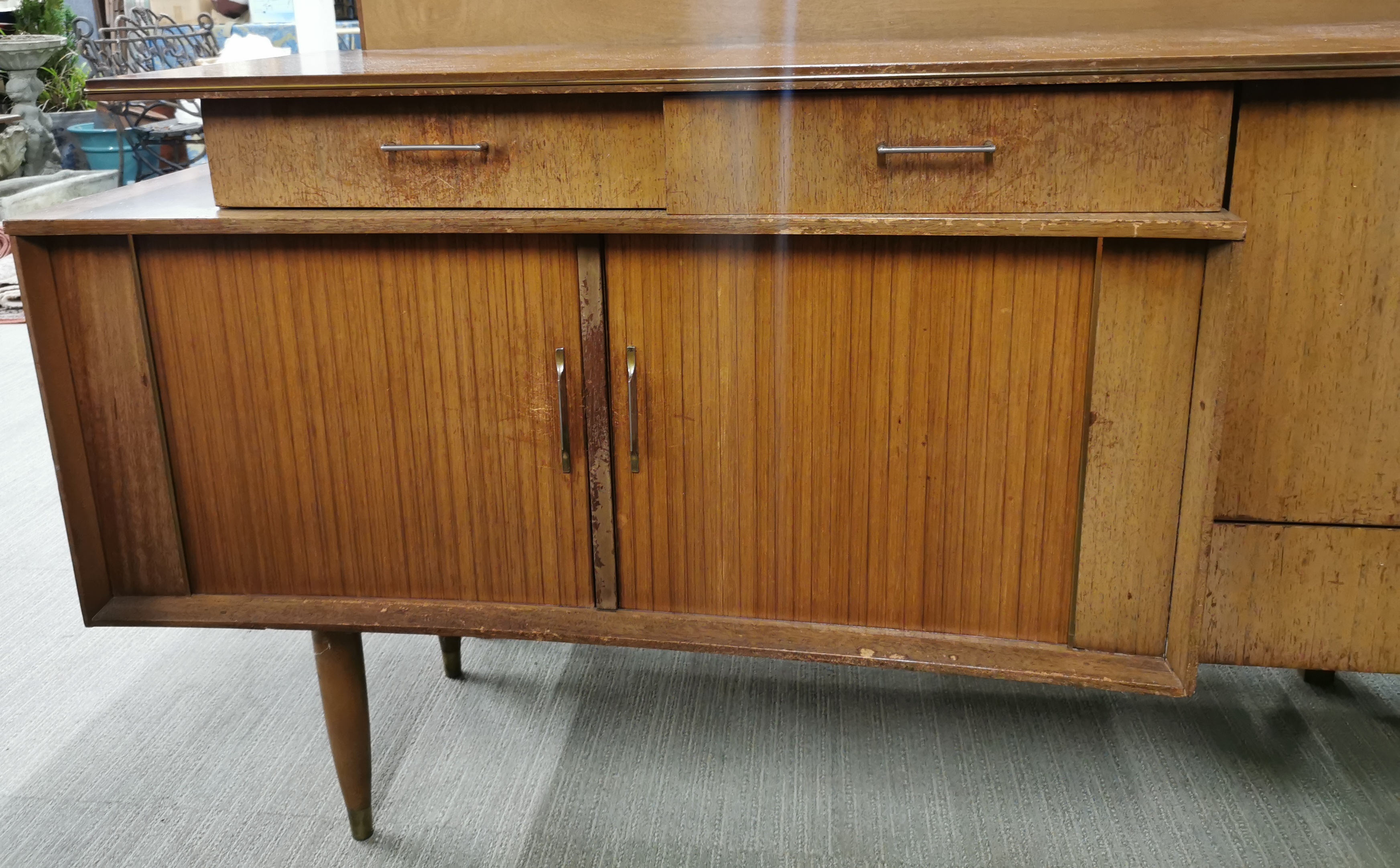 A 1970's teak sideboard with sliding door and a drop down cabinet with glass shelf, 145 x 79 x - Image 3 of 4