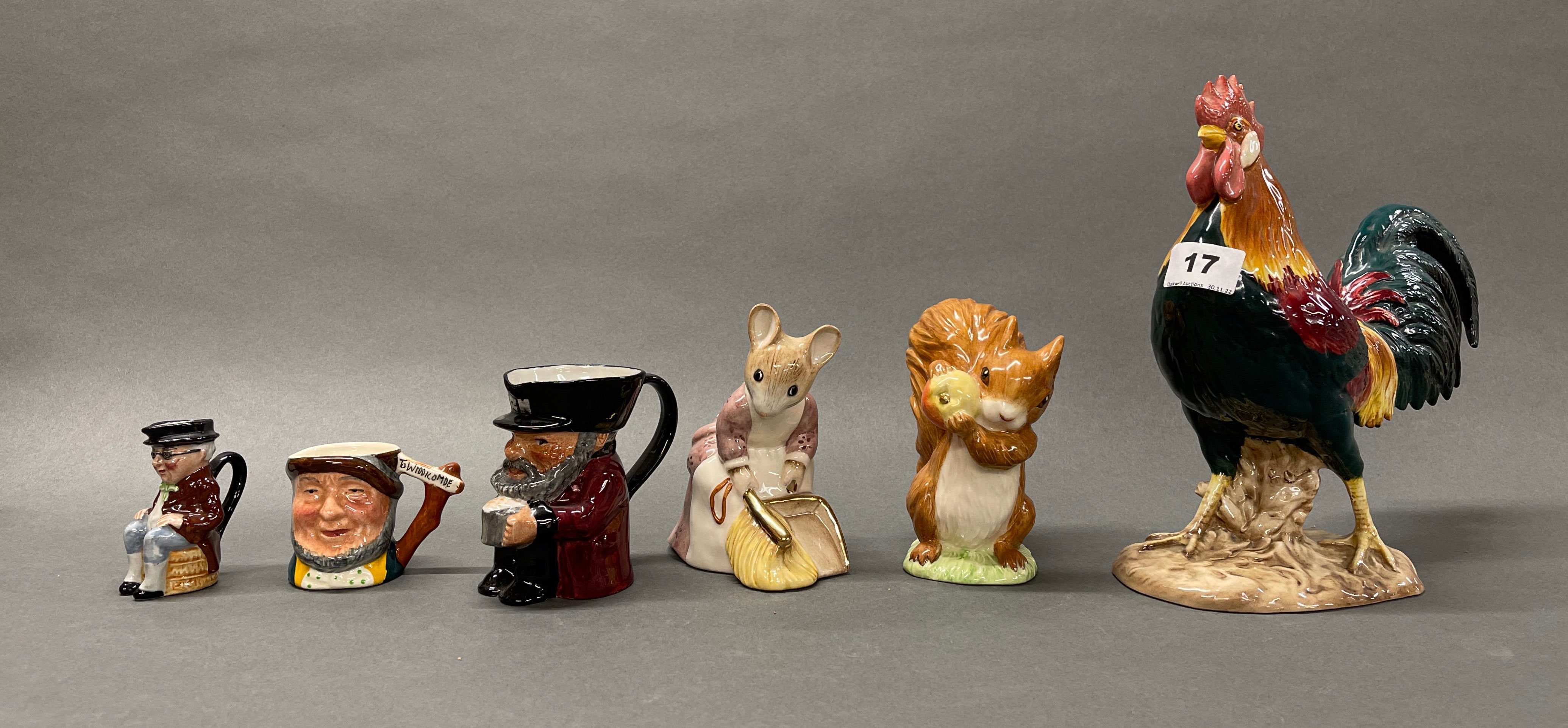 Three Beswick figures, together with three small ceramic character jugs, tallest jug H. 10cm,