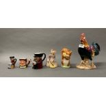 Three Beswick figures, together with three small ceramic character jugs, tallest jug H. 10cm,