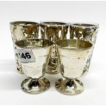 Two hallmarked silver cups, H. 7.5cm, together with three sterling silver and glass tumblers.