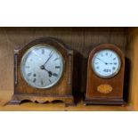 An Edwardian mahogany inlaid mantel clock, H. 20cm, together with a 1930's oak mantel clock.