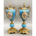 A pair of French ormolu mounted porcelain garnitures, H. 46cm.