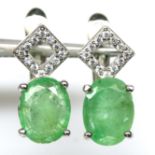 A pair of 925 silver drop earrings set with oval cut emerald and white stones, L. 1.4cm.