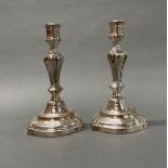 A pair of silver plated candlesticks, H. 20.5cm.