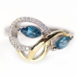 A 925 silver gilt ring set with marquise cut London blue topaz, (N.5).